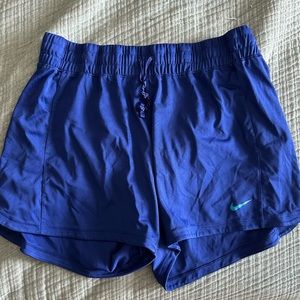 Blue Nike shorts. Size Medium